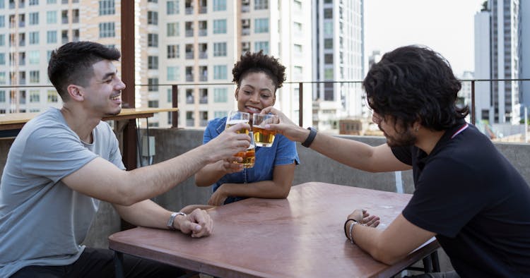 A Group Of Friends Toasting Drinks