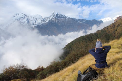 Free stock photo of above clouds, backpack, beanie