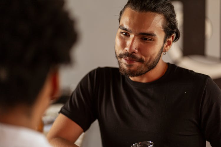 Portrait Of Man Listening To Conversation