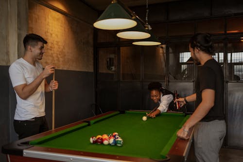 Friends Playing Billiard 