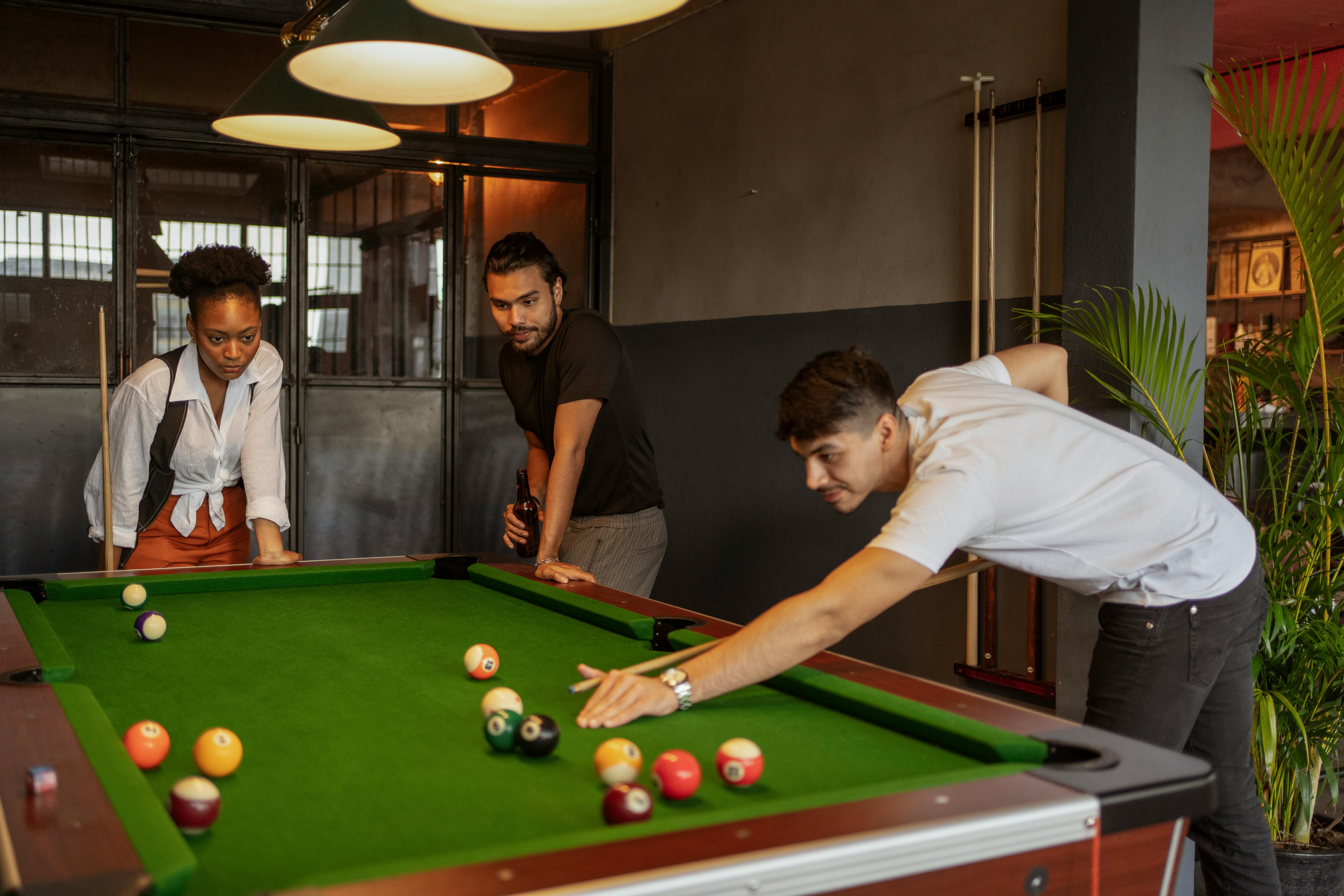 friends playing snooker