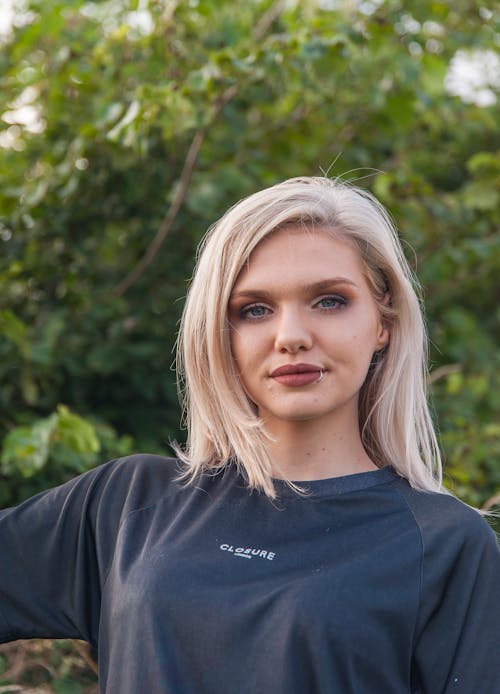 Woman in Crew Neck T-shirt with Lip Piercing