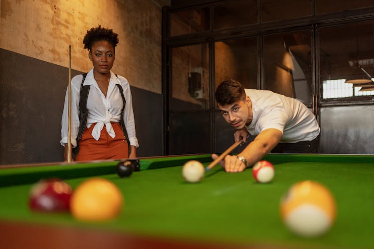 Man And Woman Playing Snooker