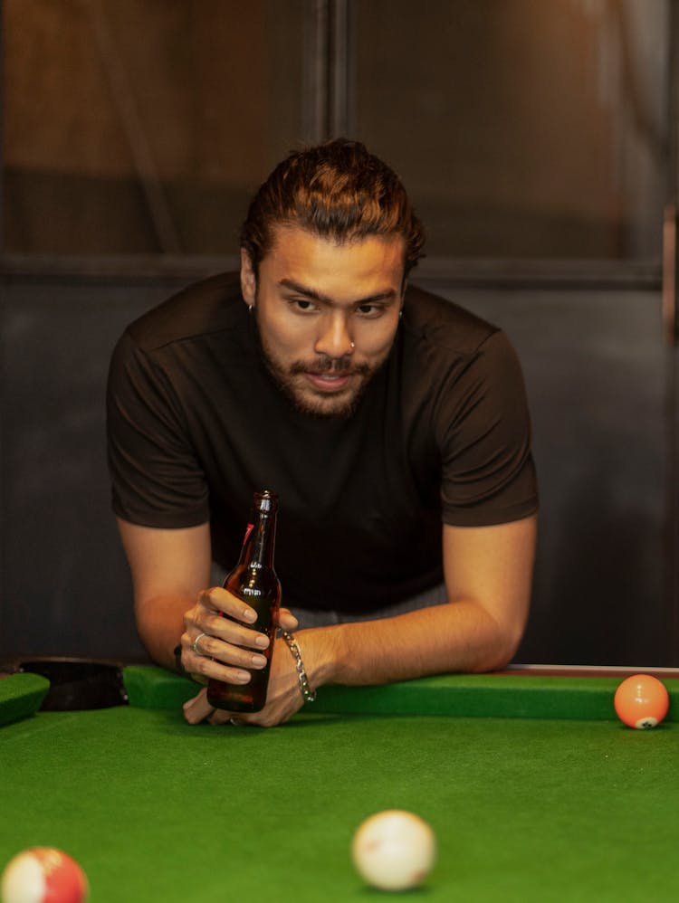 Man With Beer By Snooker Table