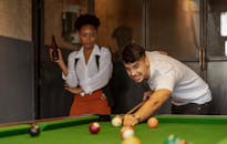 Man in White Dress Shirt Playing Billiard