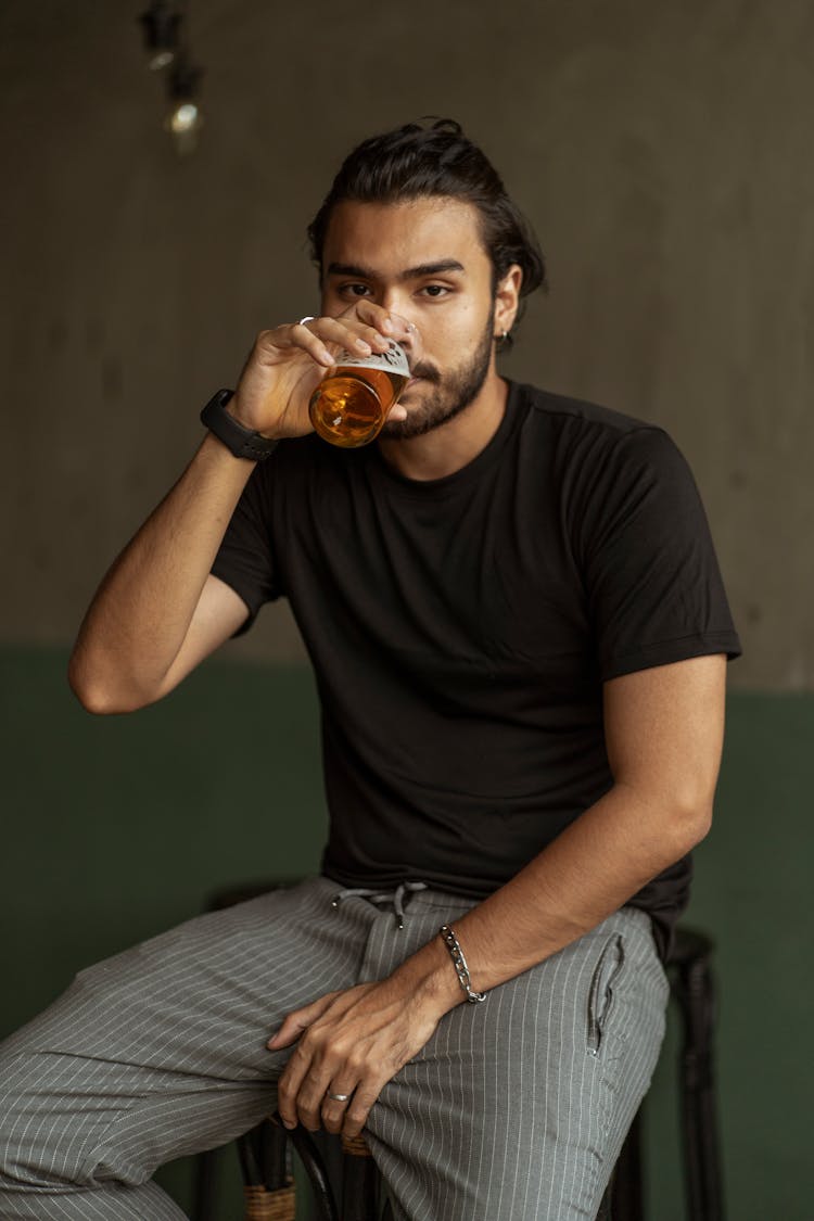 Portrait Of A Man Drinking Beer