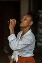Man in White Dress Shirt Drinking Coca Cola