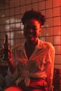 Man in White Button Up Shirt Holding Bottle