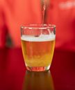 Clear Drinking Glass With Brown Liquid
