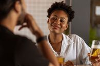 Woman in White Button Up Shirt Smiling