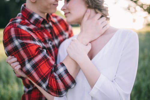 Free Close Up Shot of Couple Holding Each Other Stock Photo