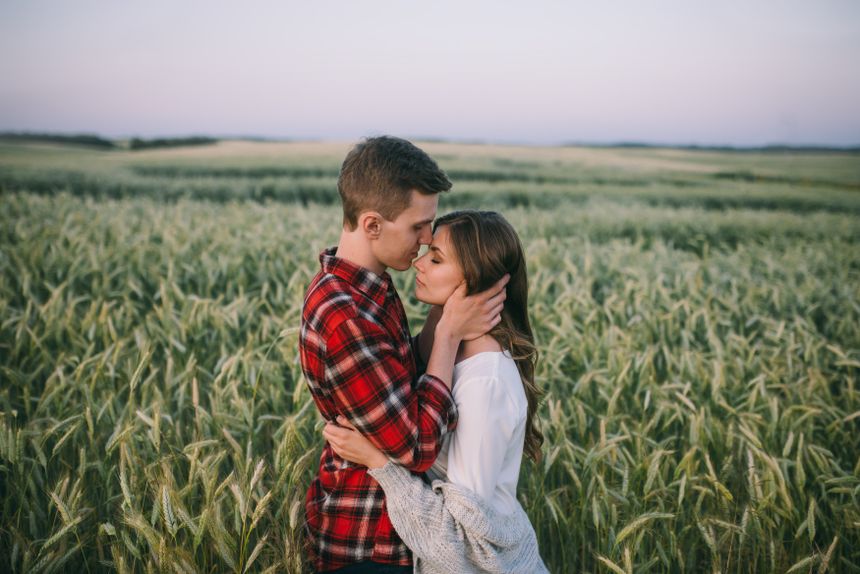 Two young people together in a sunlit field — photo by Leeloo The First on Pexels