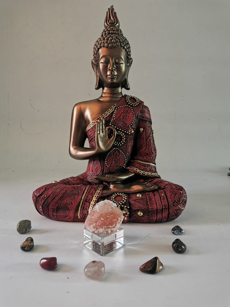 Buddha Statue And Precious Stones