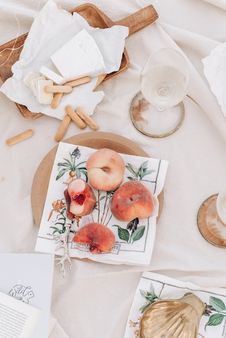 Foods Over Napkins On Picnic Blanket