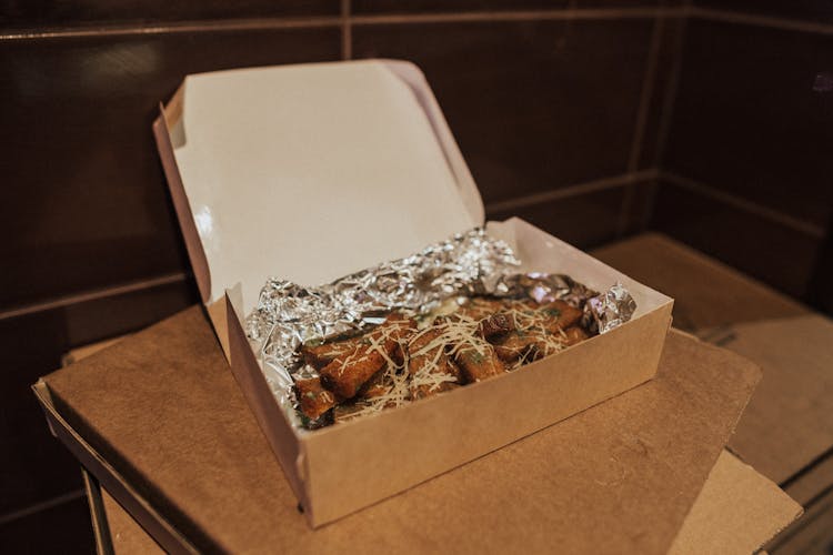 Food In Brown And Silver Box