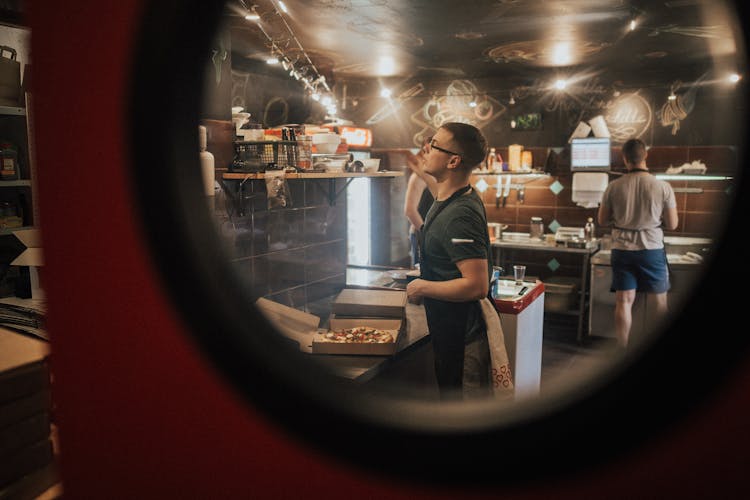 Men Working In Restaurant Kitchen