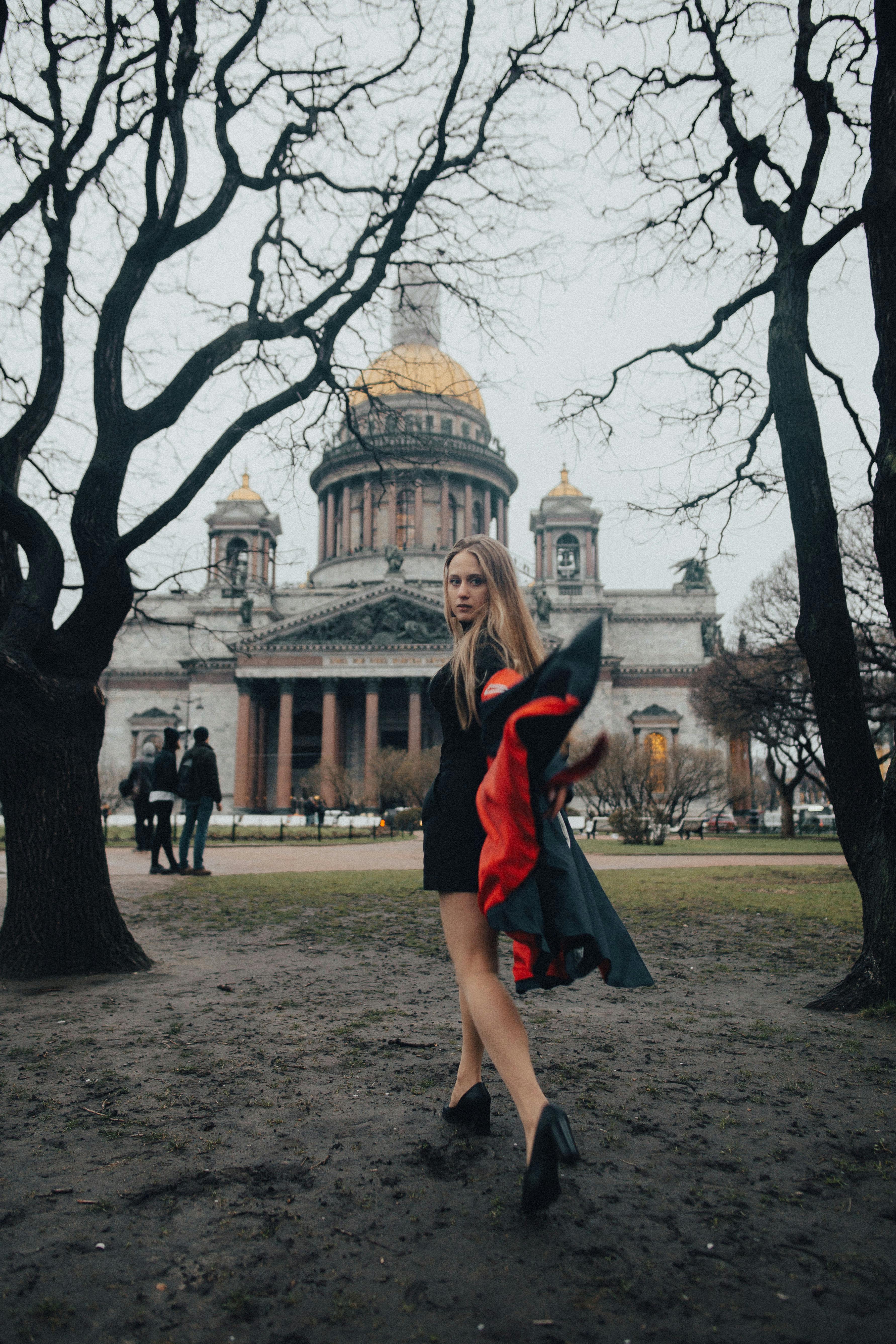 woman removing her coat