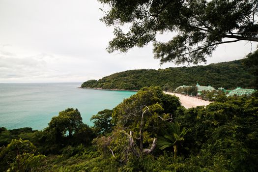 Discover the tranquil beauty of a lush, tropical coastline in Phuket, Thailand, perfect for a serene escape.