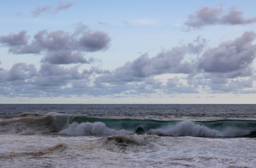 Free stock photo of beach, cloud formation, crashing waves Stock Photo