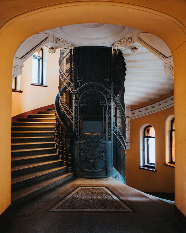 Vintage Elevator And Stairway In An Old Building