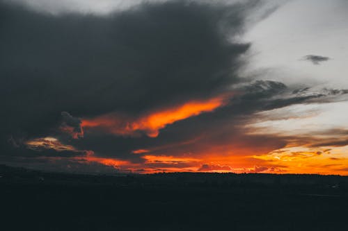 Free Orange and Black Clouds during Sunset Stock Photo
