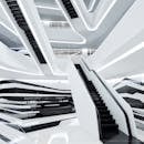 引人注目的极简主义内饰，采用未来主义设计和几何线条，并配备了自动扶梯，营造出充满现代感的环境