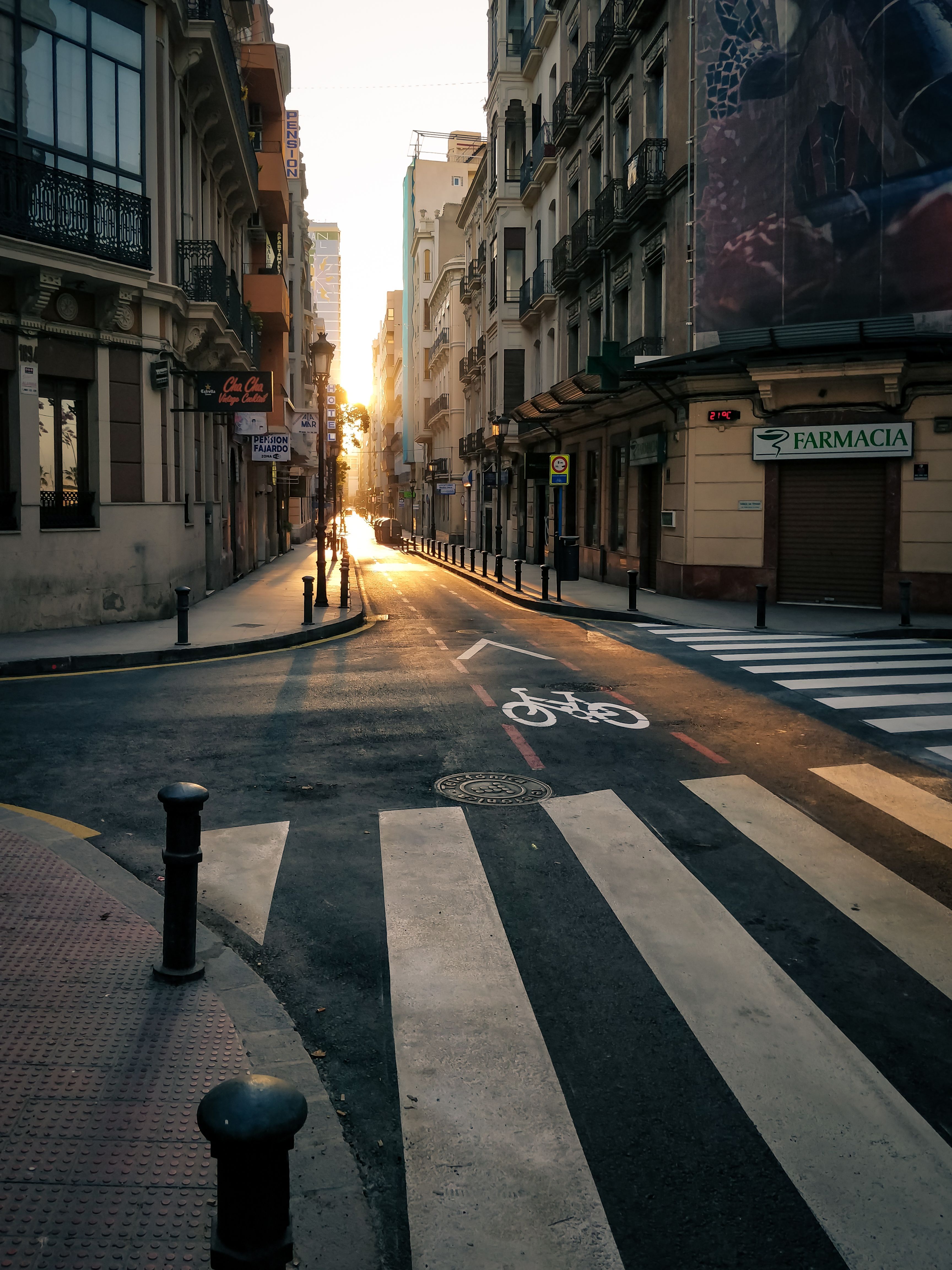 Narrow Street Between Concrete Buildings · Free Stock Photo
