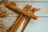 Brown Wooden Sticks on White Surface