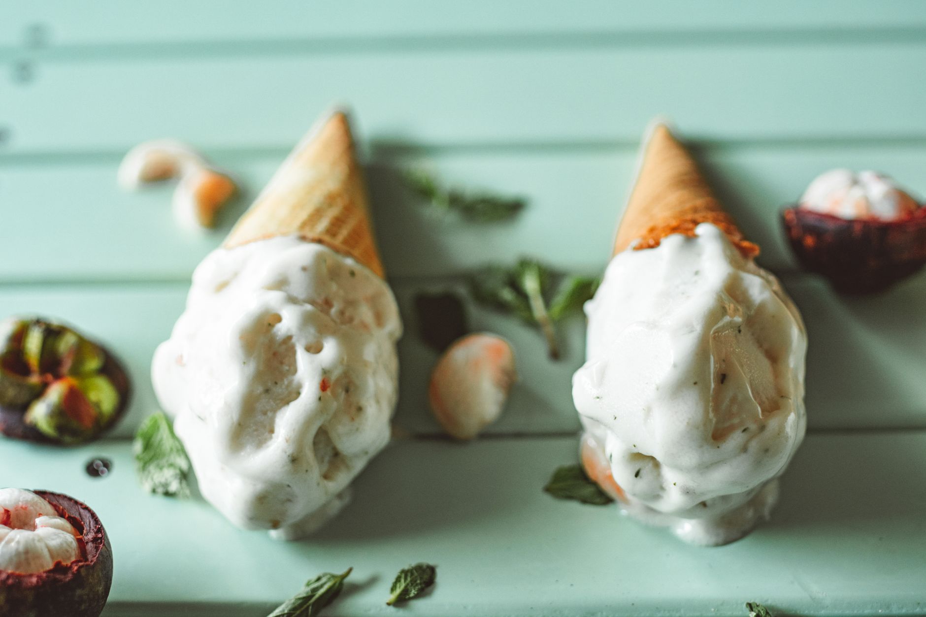 Chocolate-dipped ice cream cones with sprinkles on top