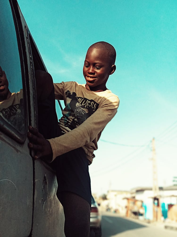 Black Boy Getting Out Of Car