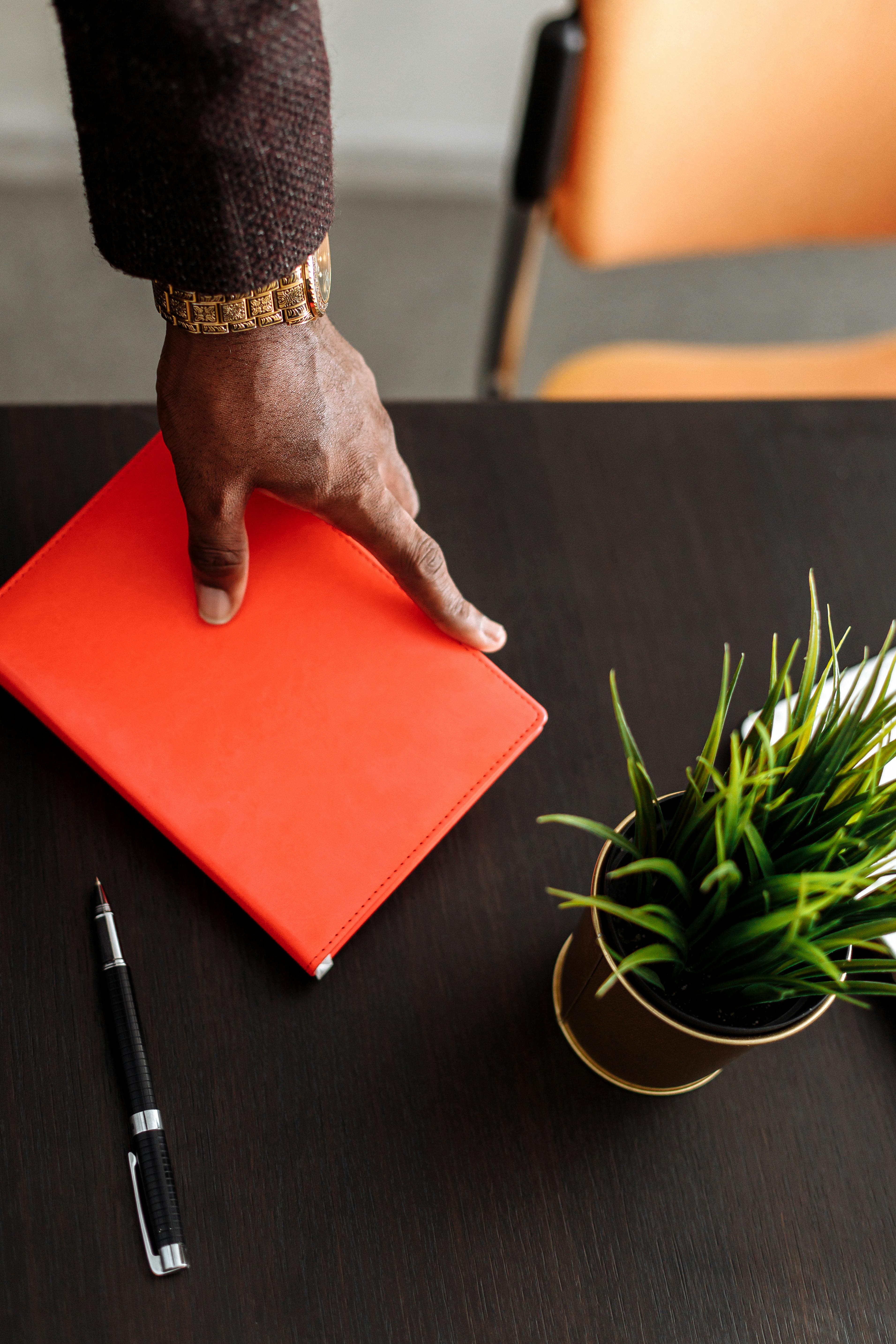 red paper on black table