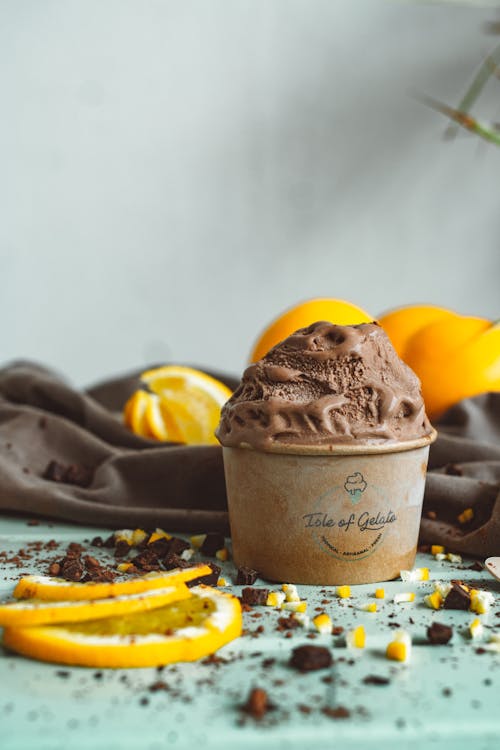 Free Chocolate Ice Cream with Lemon Bits in a Cup Stock Photo
