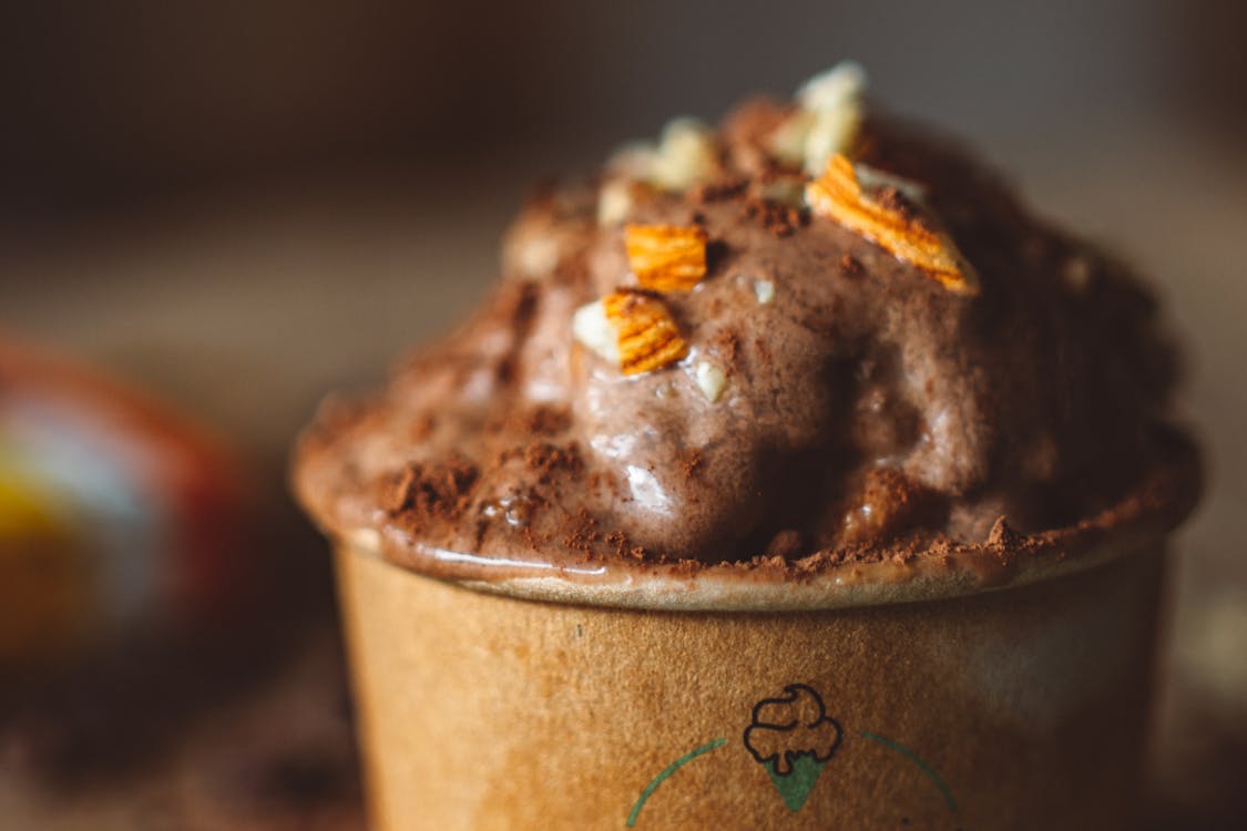 Melting Chocolate Ice Cream in Paper Cup · Free Stock Photo