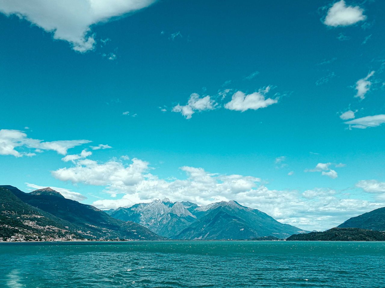 breathtaking scenery of rocky mountain ridge surrounding turquoise cal