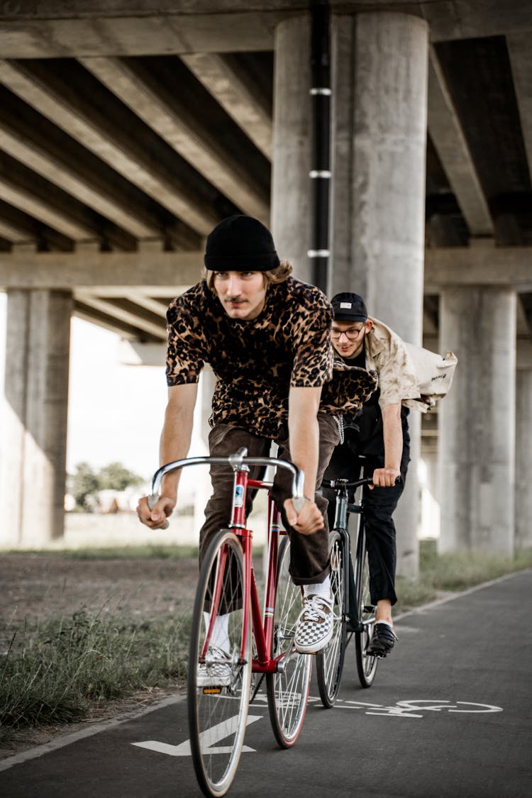 Men Riding On A Bike Touring On The Road