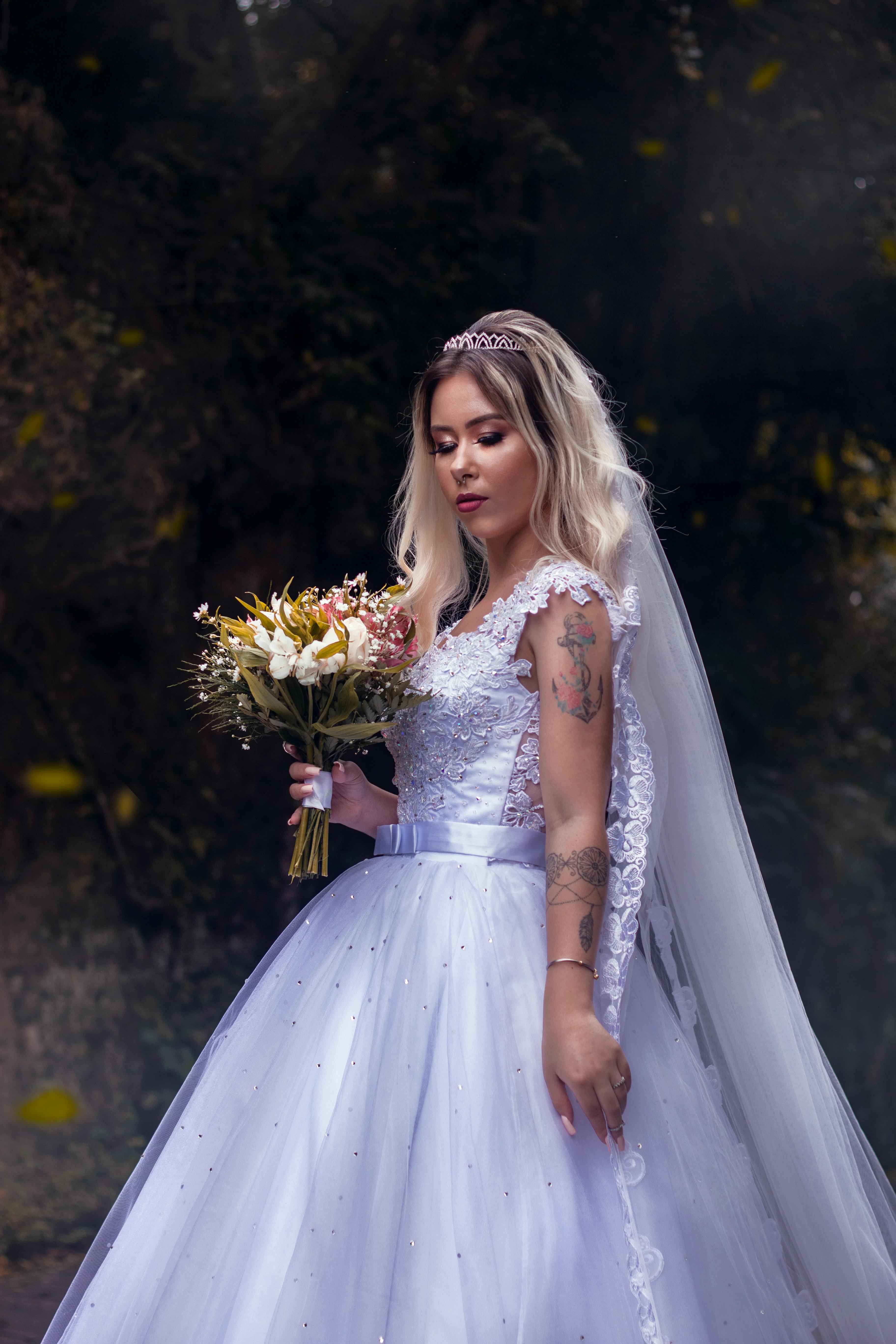 Woman in White Dress Sitting on Wooden Floor · Free Stock Photo