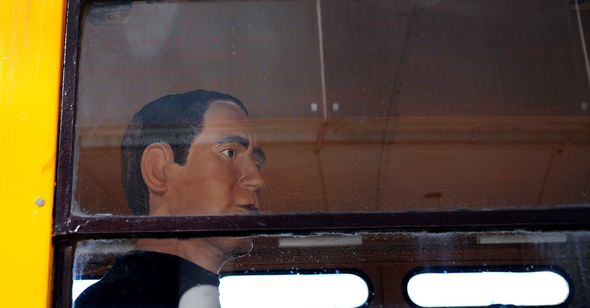 Free stock photo of bus window, mannequin, public transportation
