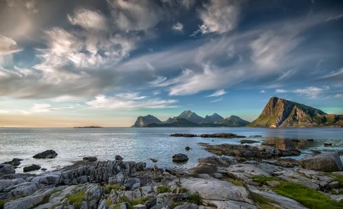 Free Serene coastal view of Sandnes, Norway with mountains and a vibrant sky. Stock Photo
