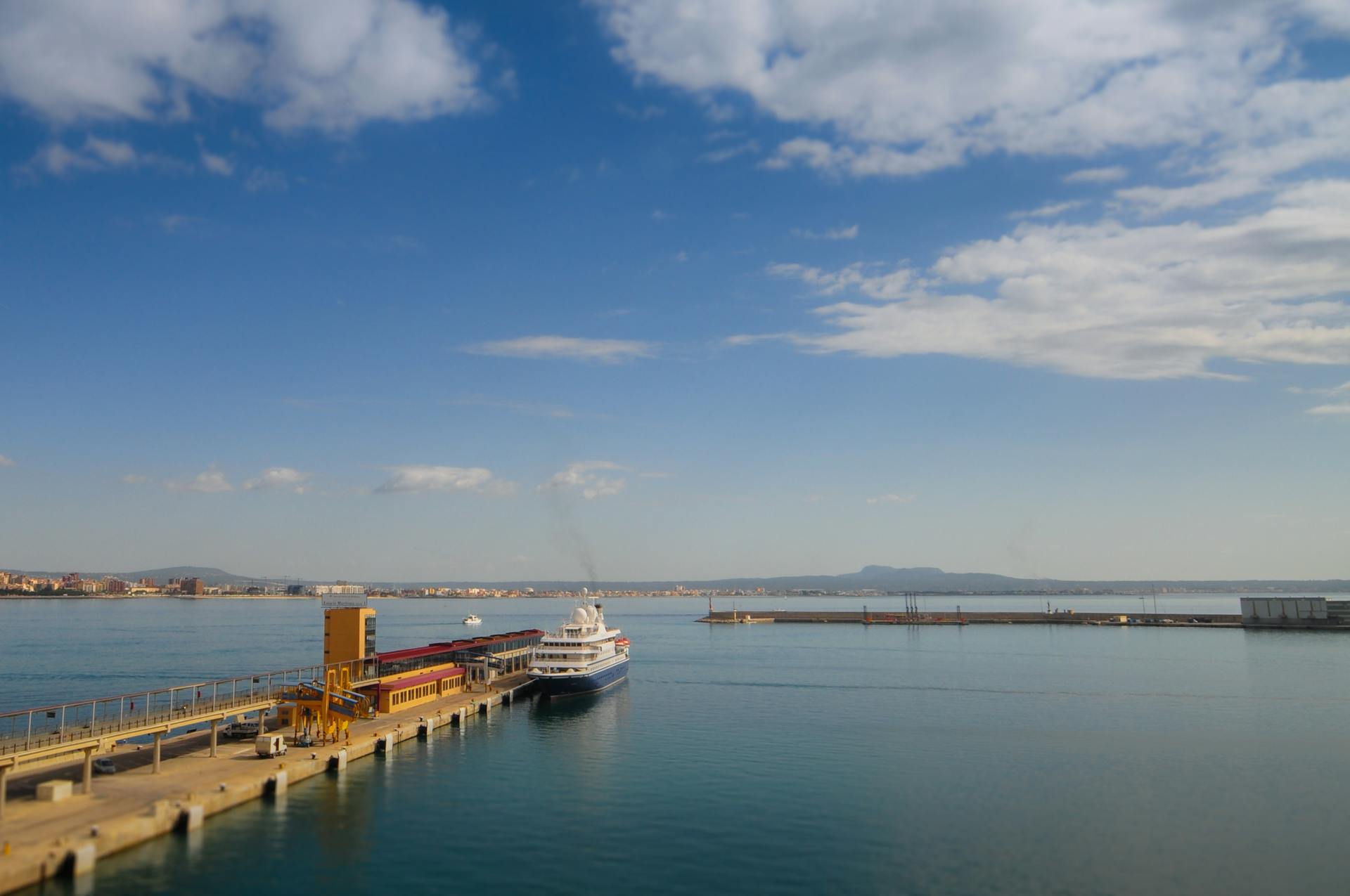 White Cruise Ship Beside Dock