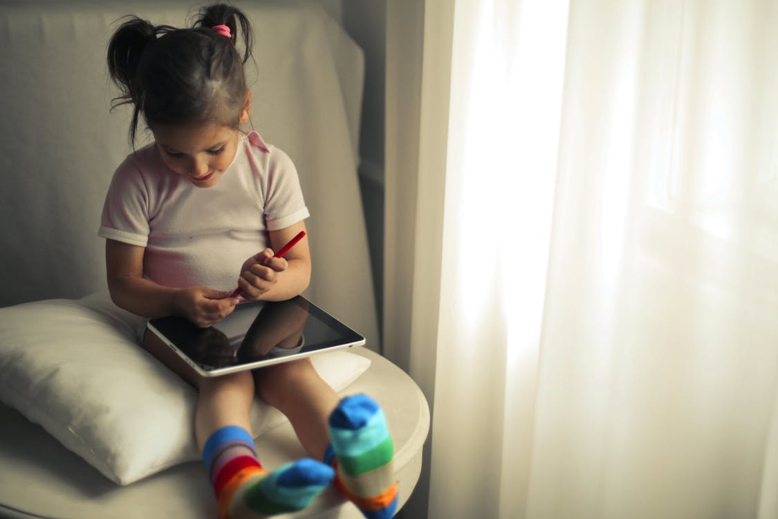 Girl Using a Tablet Computer