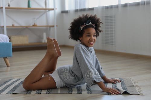 Free Content ethnic girl doing yoga pose Stock Photo