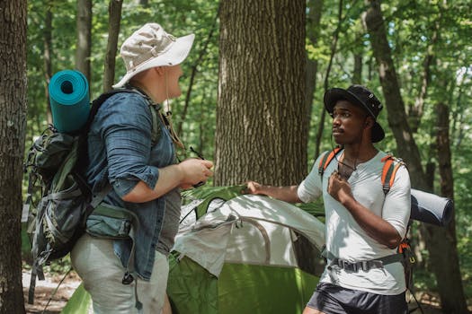 Two friends in a forest setting, camping and enjoying nature, equipped with hiking gear.