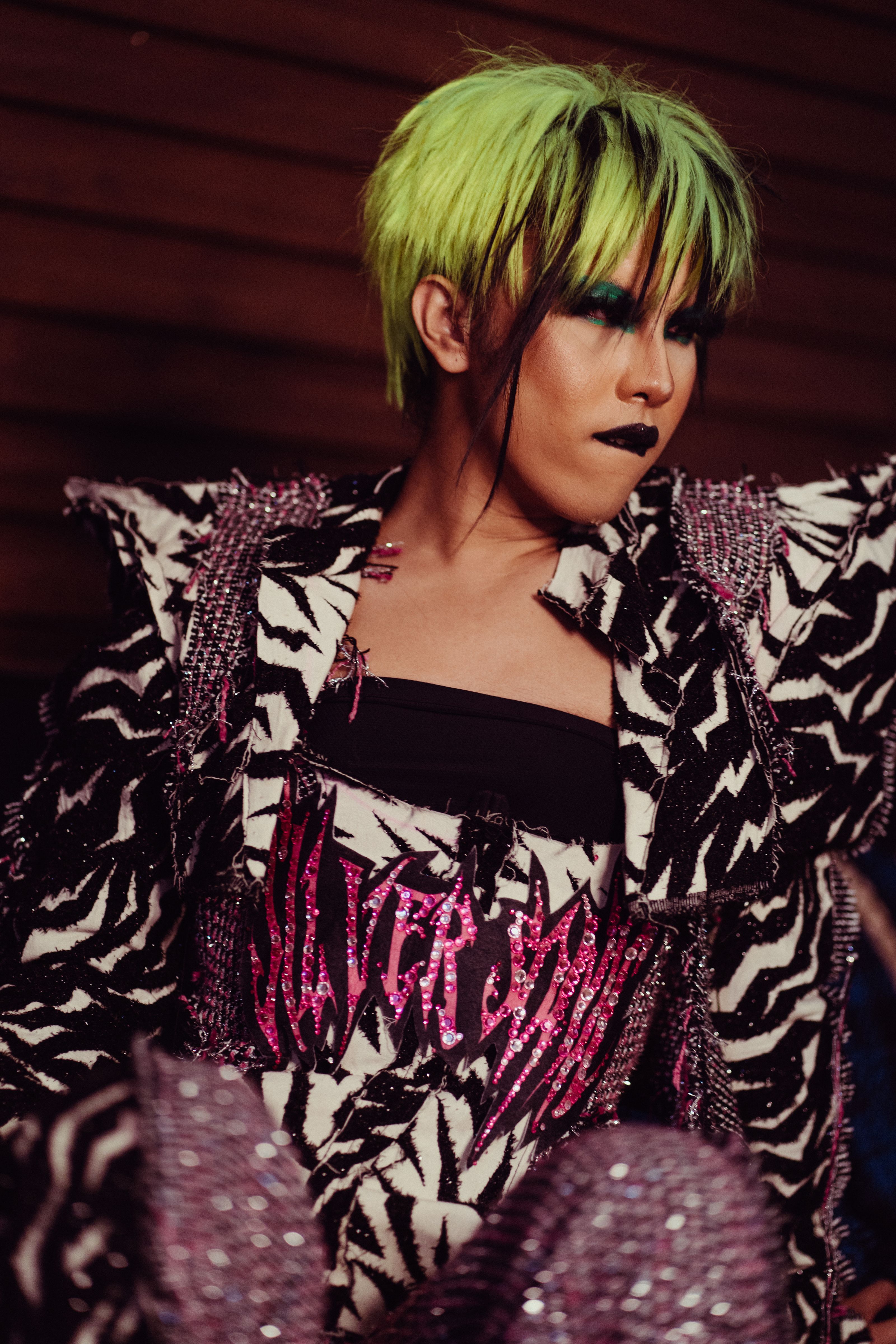 A confident fashion portrait with expressive styling