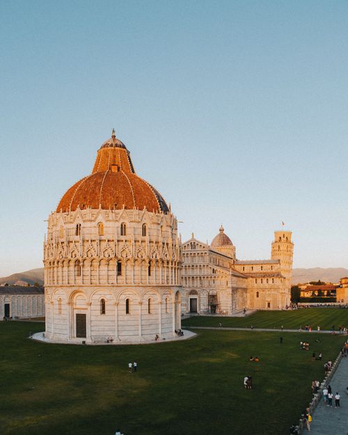 Free A stunning aerial shot of Pisa Baptistery with vibrant evening light. Stock Photo