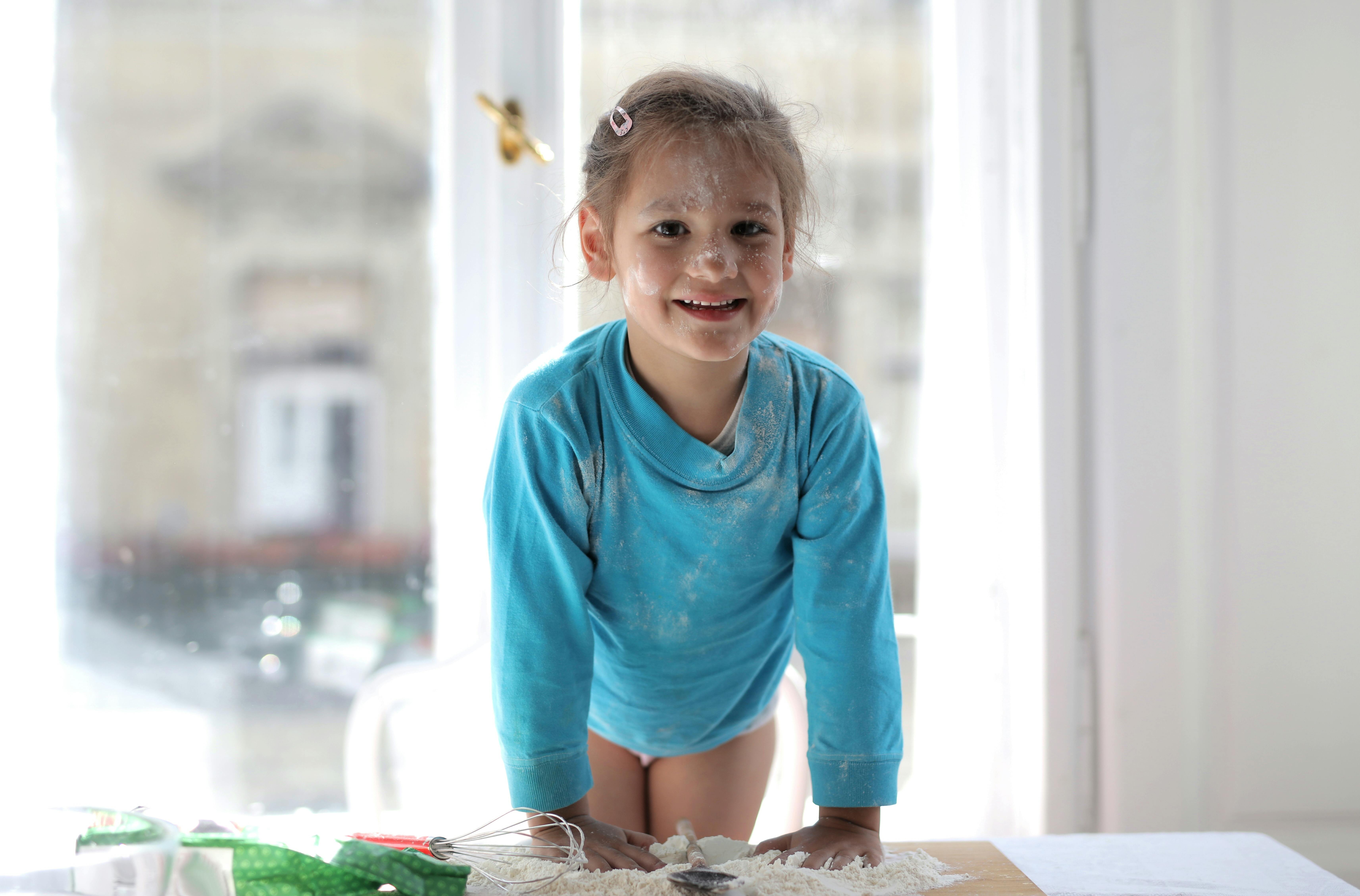 A Girl Covered in Flour · Free Stock Photo