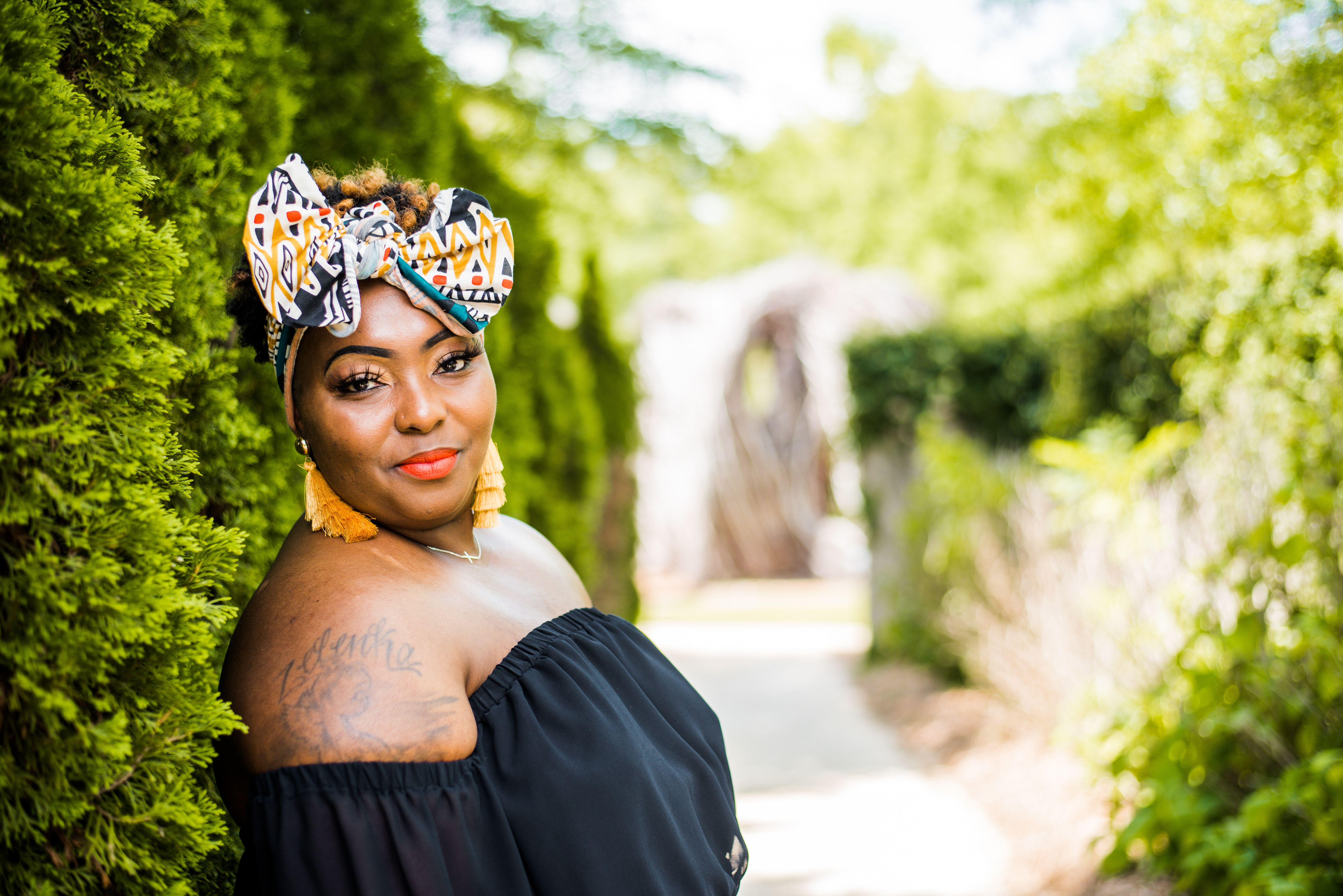 Plus Size Model in Headscarf and Off Shoulder Blouse · Free Stock Photo