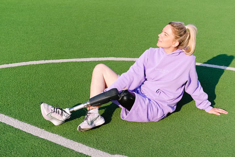 Woman With Leg Prosthesis On Sports Court