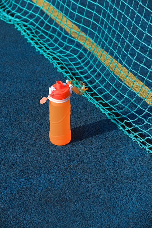 Bottle of water on sport ground 