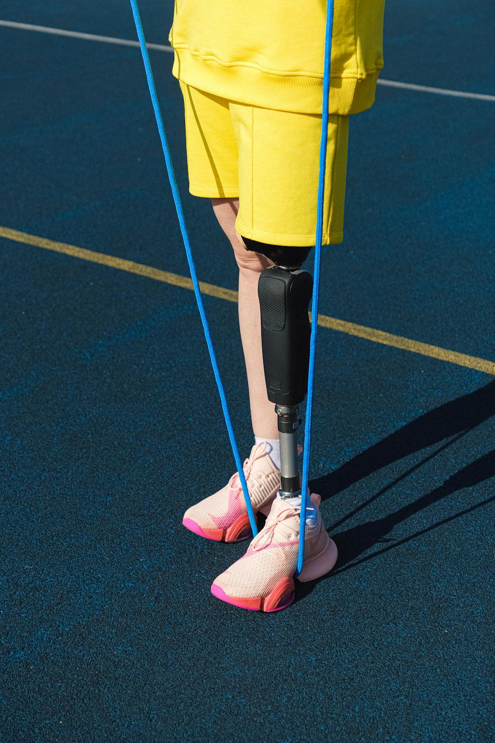 Person with Prosthetic Leg Stepping on a Rope · Free Stock Photo