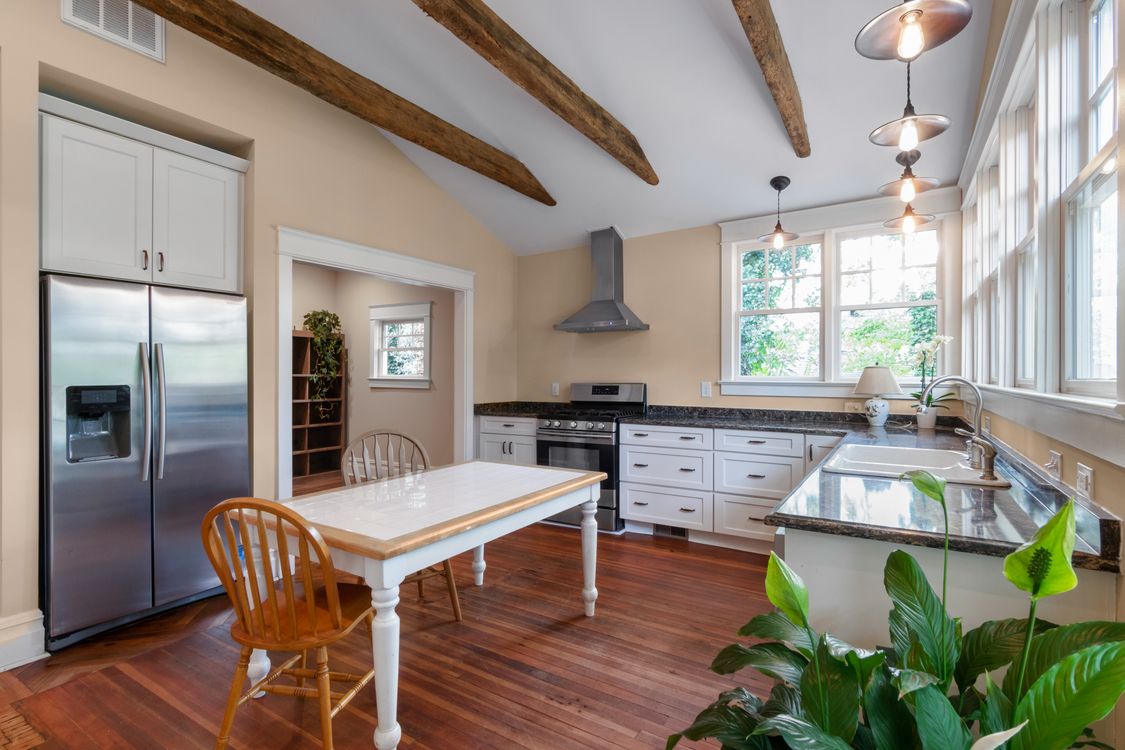 Brown Wooden Table Near Window